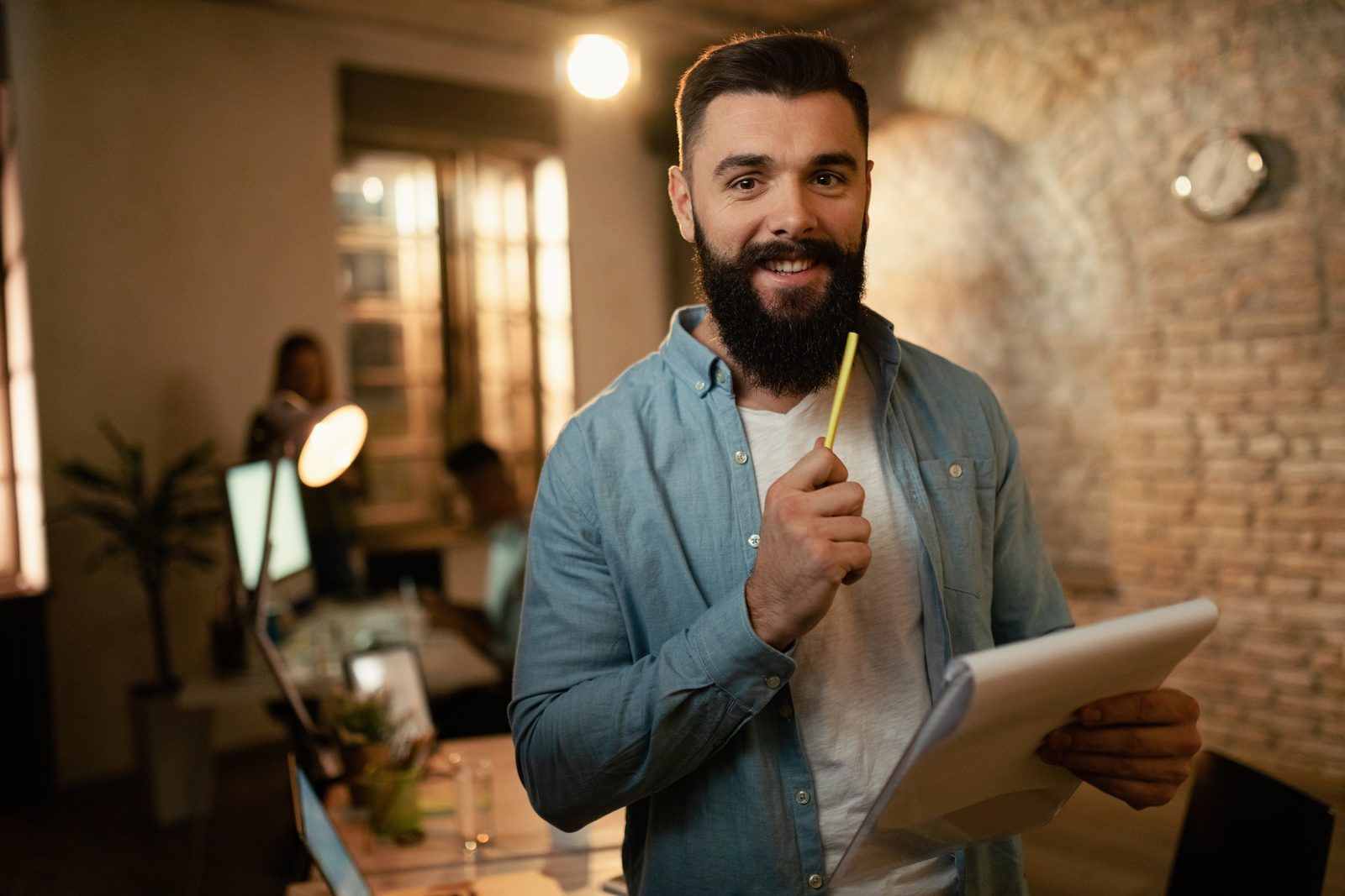 A business owner reviewing reports at their workplace